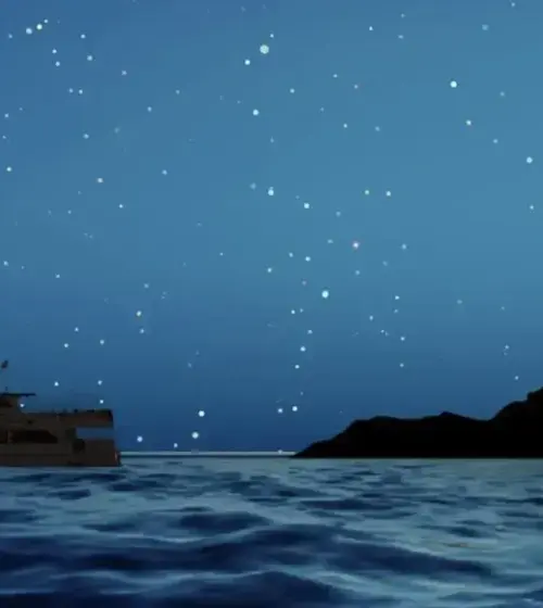 Boat on ocean at night under crescent moon and starry sky with distant island silhouette